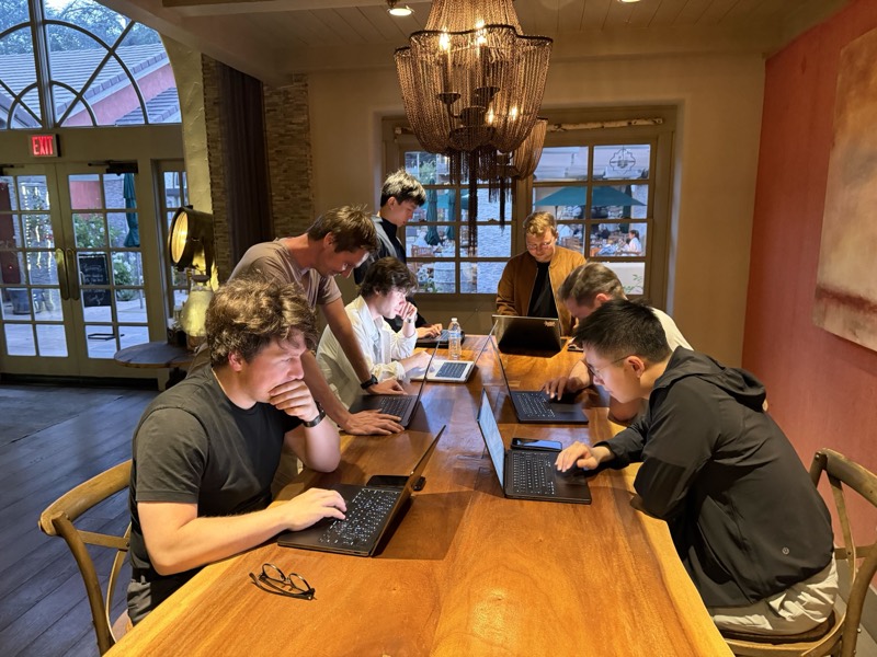 The team deep in a late-evening work session